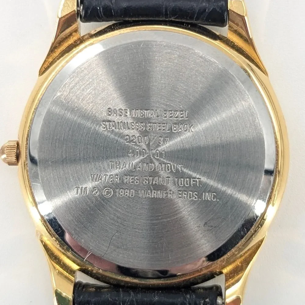 Armitron Looney Tunes Collectors Edition Gold Black Leather Band Watch